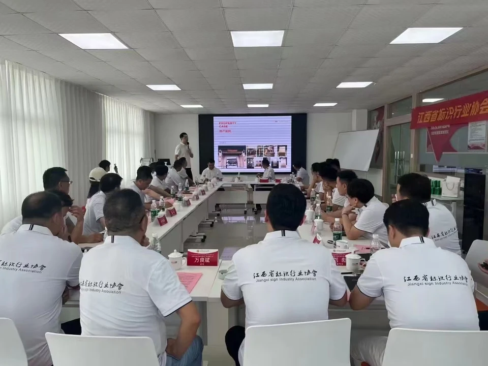 Industry visitors attending a presentation at Jayu