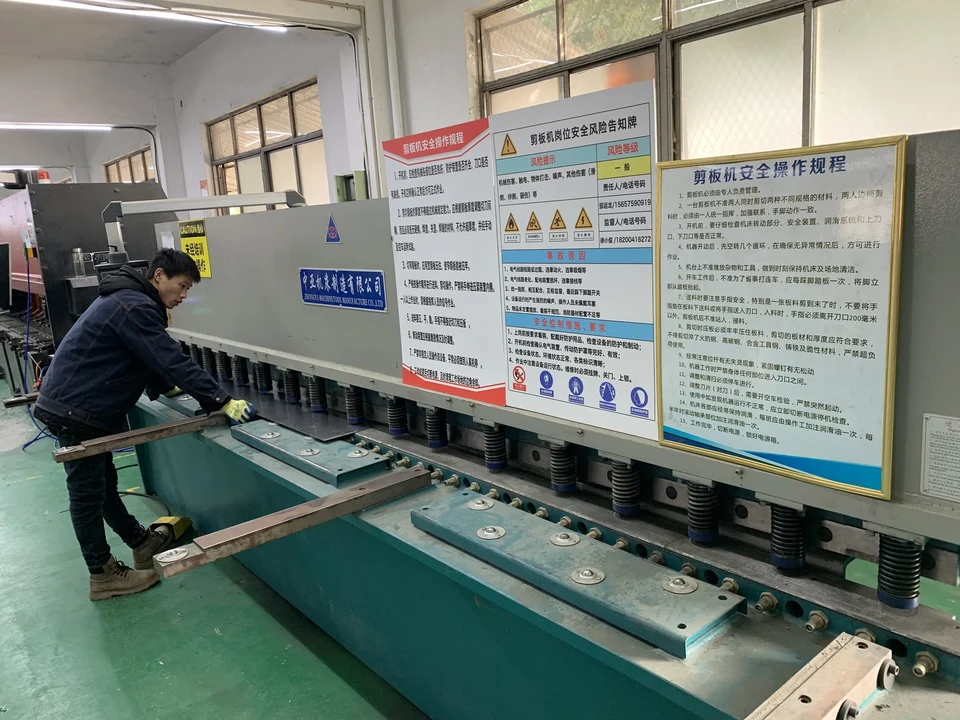 Team member operating workshop equipment